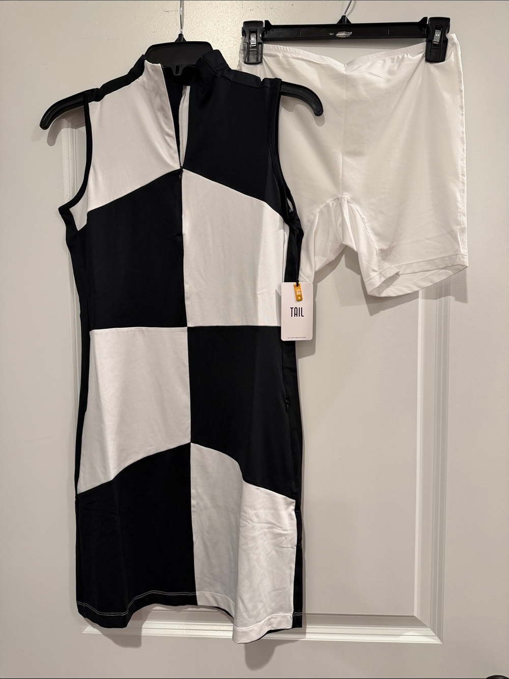 TAIL Black and White Checkerboard Sleeveless Mini Golf Dress with White Shorts